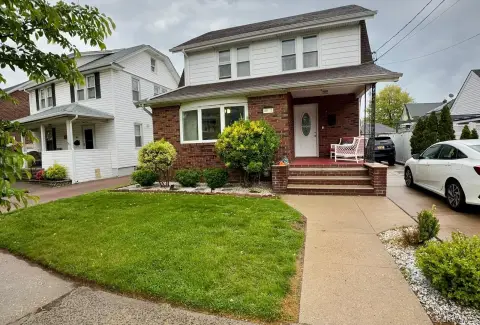 Well-Kept Two-Family Home with Garage