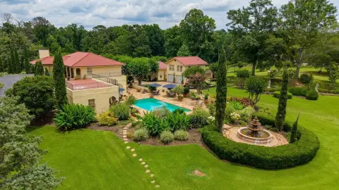 Sprawling Fenced Estate Compound