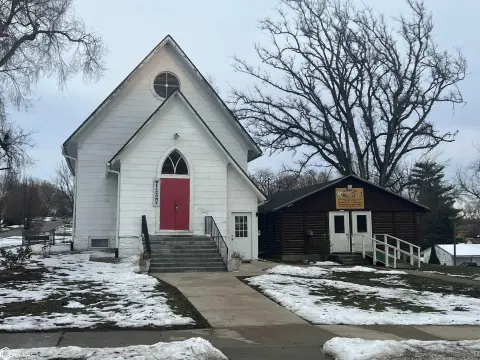 Historic Church with Log Cabin