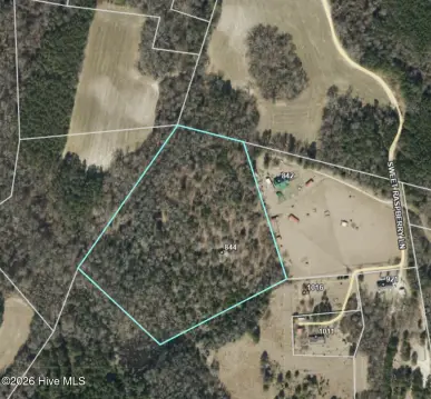 Land with Metal Storage Building