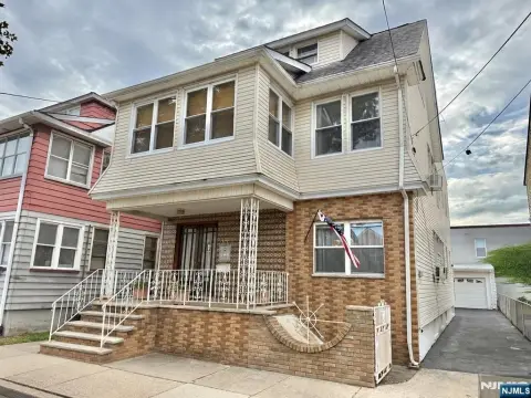 Duplex with Detached Two-Car Garage