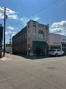 Retail and Office Building with Apartment