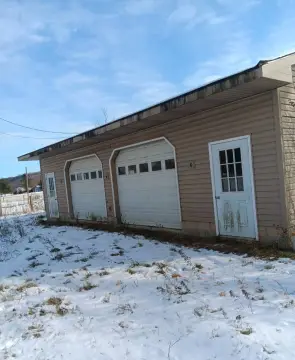 Fenced Land with Garage, Pond