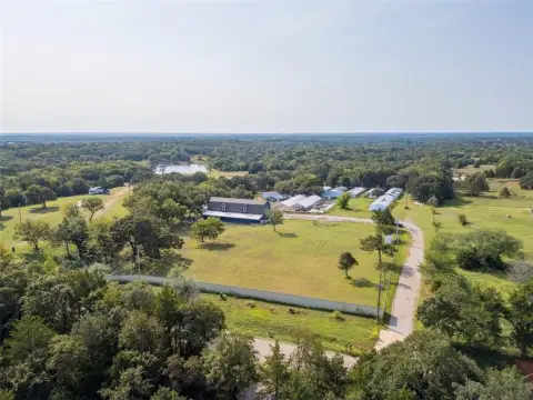 Macomb Land with Multiple Greenhouses