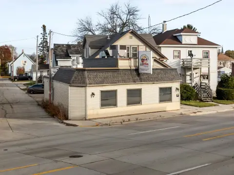 Mixed-Use Building with Upper-Level Residence