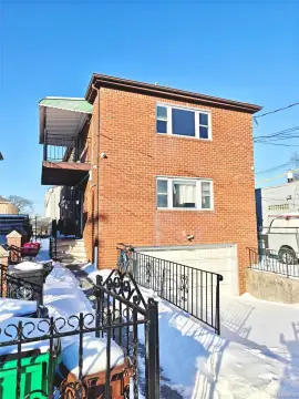 College Point Two-Family Brick Home