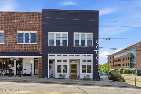 Historic Mixed-Use Building with Vacant Lot
