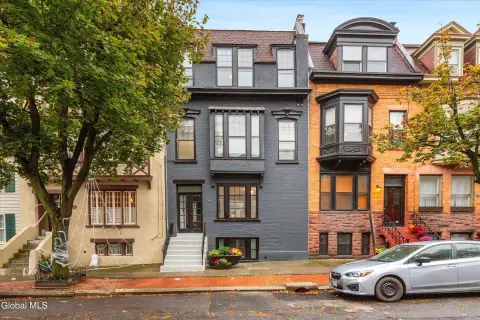 Renovated Multifamily Residence with Garden