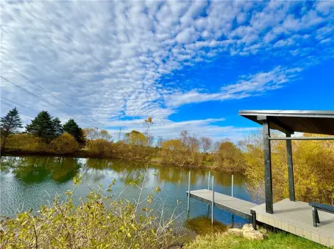 Land with Pond and Deck