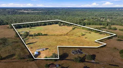 Fenced Pastureland With Ponds