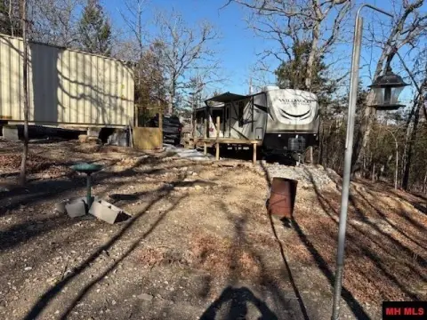 Turn-Key Acreage with Camper and Shop