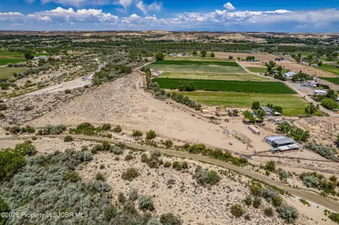 Irrigated Ranch Acreage with Barns