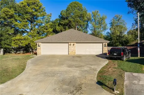 Occupied Duplex with Attached Garages