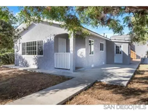 Updated Corner-Lot Triplex