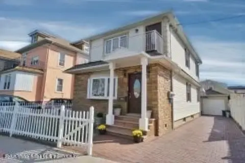 Renovated Two-Family Home with Garage