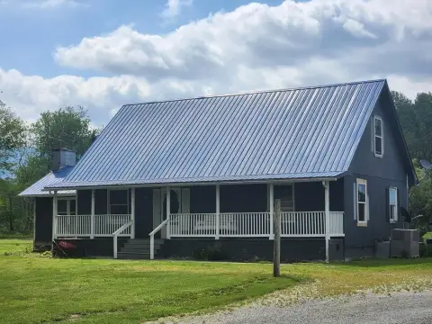 Farmhouse with Mountain Views and Acreage