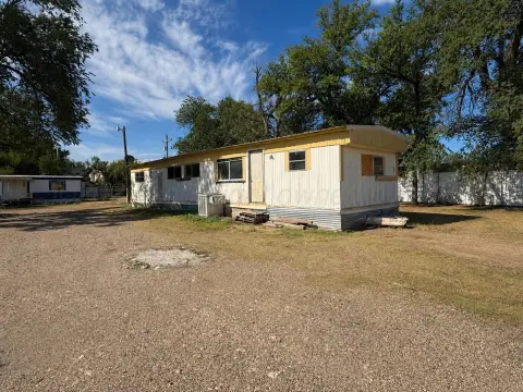 Mobile Home Park with Owned Home