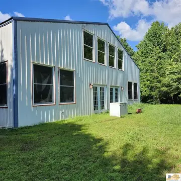 Spacious Barndominium on Wooded Acreage