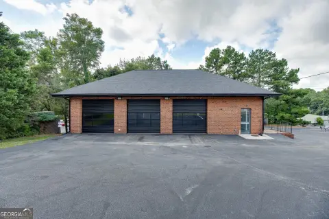 Brick Retail Building with Garage Doors
