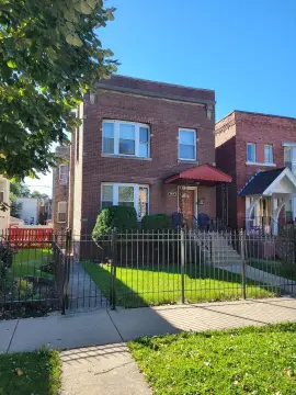 Brick Duplex with Detached Garage