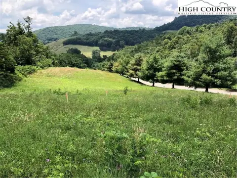 Wooded Land with Mountain Views