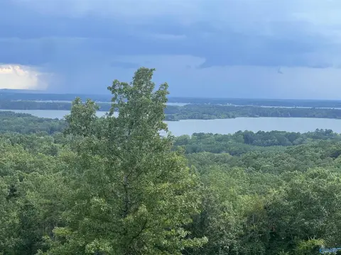 Land with Mountain and Lake Views