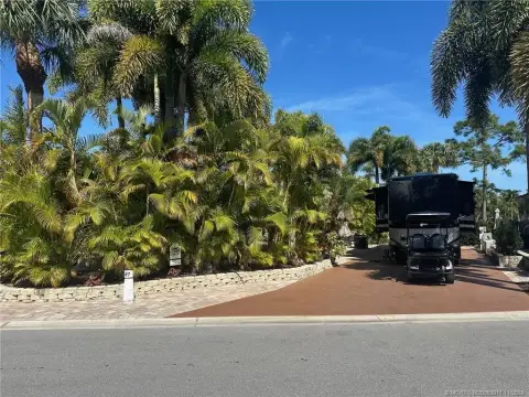 Turnkey Corner Lot Overlooking Golf