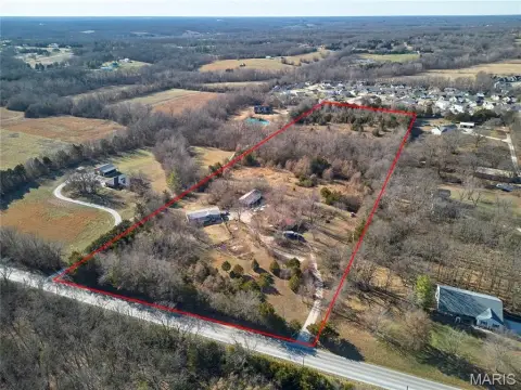 Unrestricted Acreage with Development Potential