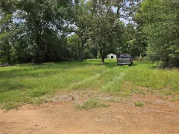 Grapeland Ranch with Creek Border