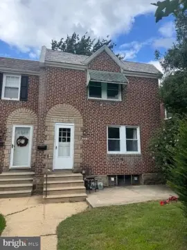 Brick Duplex with Attached Garage