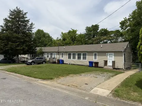 Four-Unit Quadplex with Renovated Unit