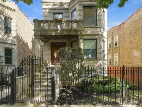 Three-Unit Stone Building with Garage