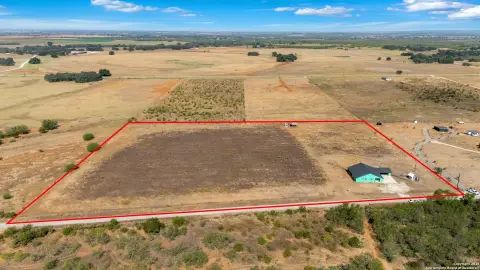 Floresville Land with Partially Built Home