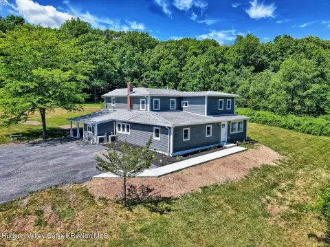 Fully Renovated Duplex with Private Acreage