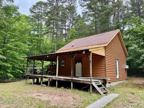 Wooded Acreage with Roughed-In Cabin