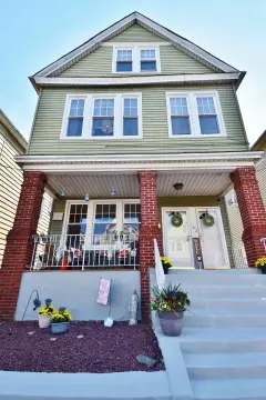 Bayonne Colonial Home with Income