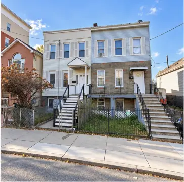 Eight-Bedroom Two-Family Property