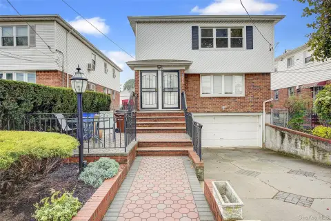 Renovated Brick Triplex with Garage