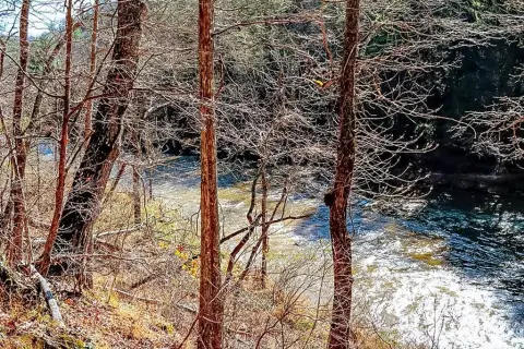 Land with Mountain and Creek Views