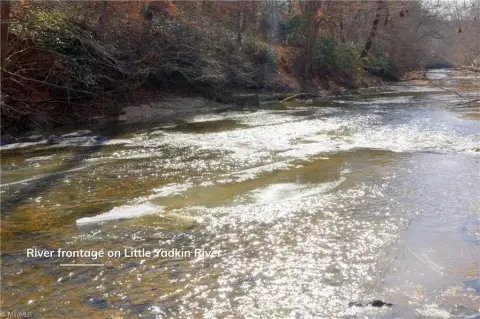 Pinnacle Land with River Frontage