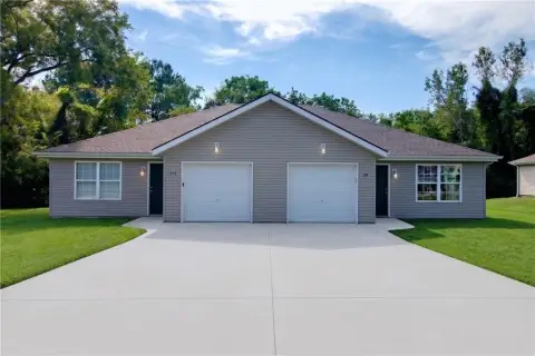 Leased Ranch Duplex with Garages