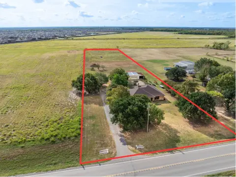 Commercial Land with Existing Improvements