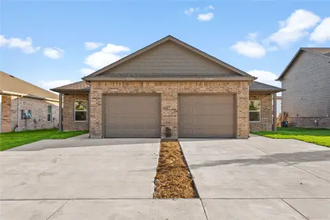 Brick Duplex with Fenced Yards