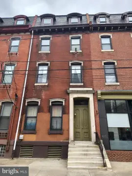Six-Unit Apartment Building with Garage