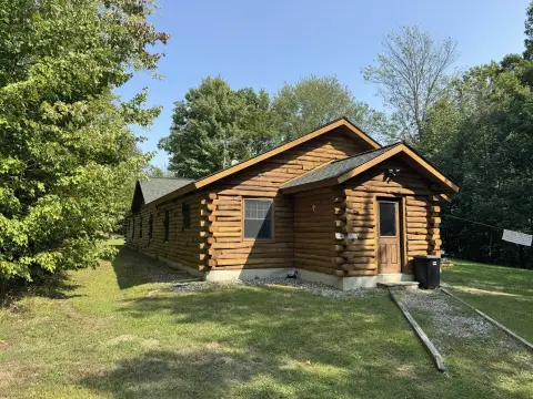 Waterfront Log Duplex For Sale