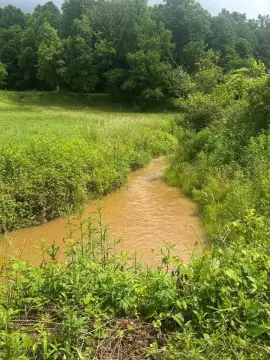 Unrestricted Acreage with Creek Frontage