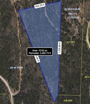 Forested Lakefront Acreage Opportunity