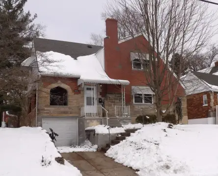 Tudor Two-Family in Garden District