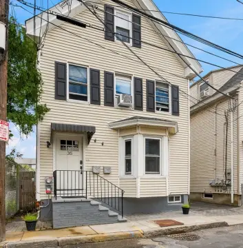 Duplex with Owned Solar Panels