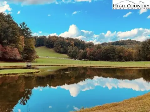 Picturesque Land with Fishing Pond